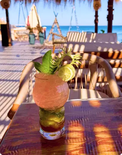 Tropical drink on a seaside restaurant table
