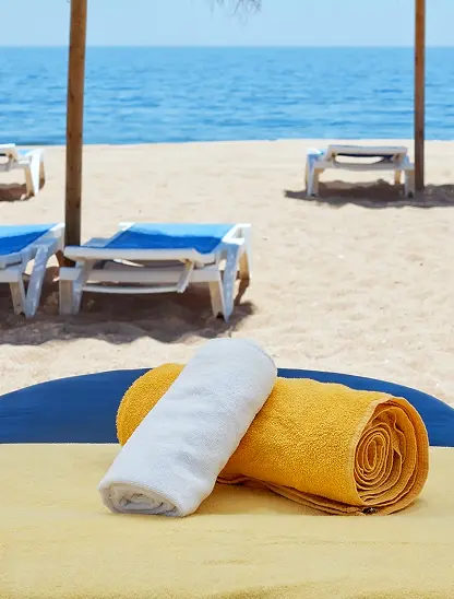 Beach lounge and towels